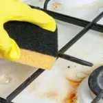 Як швидко очистити решітку газової плити від жиру